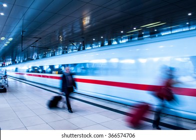 Frankfurt Airport Train station with blur business people movement in rush hour