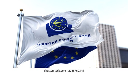 Frankfurt, GER, March 2022: The flag of the European Central Bank waving in the wind with the European Union flag blurred in the background. European currency.