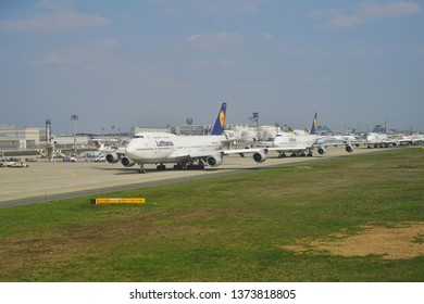 FRANKFURT, GERMANY -14 APR 2019- View Of A Line Of Boeing 747-8 Airplanes From German Airline Lufthansa (LH) Queuing Up For Takeoff At The Frankfurt Airport (FRA).