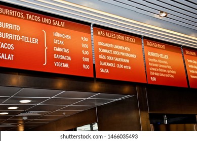 FRANKFURT, GERMANY - 2013: Chipotle Restaurant Menu In German. Chipotle Items:burrito, Burrito Plate, Tacos, Salad, Chicken, Steak, Carnitas, Barbacoa, Cilantro-lime-rice, Black Or Pinto Beans, 