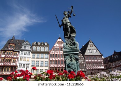 FRANKFURT, GERMANY - AUG 23: The Statue of Lady Justice in Romer Square on August 23, 2012 in Frankfurt, Germany. Romer Square had been the site for the Frankfurt city government for over 600 years.