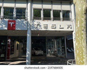 Frankfurt, Germany, August 15, 2022: Tesla Motors Corporation Fortune 500 High-tech American Electric Vehicle Company Flagship Dealership Store With Logo.