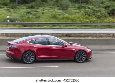 FRANKFURT, GERMANY - JULY 12, 2016: Tesla Model S luxury electric sedan on the highway in Germany