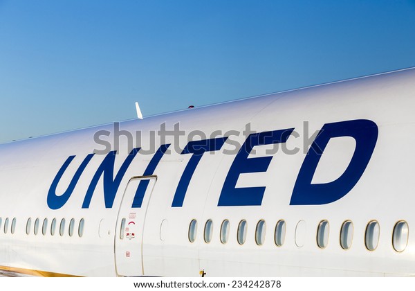 FRANKFURT, GERMANY - JULY 17, 2014: United\
Airlines aircraft logo at an aircraft in Frankfurt. United Airlines\
is headquartered in Chicago,\
Illinois.
