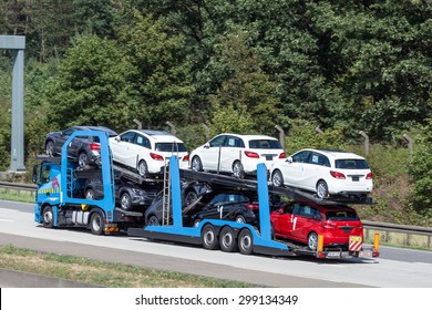 FRANKFURT, GERMANY - JULY 21: Car transporter truck moving at the A5 highway near Frankfurt in Germany. July 21, 2015 in Frankfurt Main, Germany
