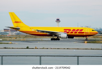 Frankfurt, Germany - July 8, 2017: DHL cargo plane at airport. Air freight shipping. Aviation and aircraft. Air transport. Global international transportation. Fly and flying.