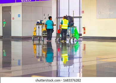 Frankfurt, Germany - March 19, 2020: Cleaning Crew Cleans The Frankfurt Airport In Early Morning Without Corona Breath Masks.