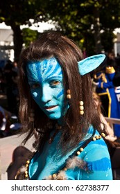 FRANKFURT, GERMANY - OCTOBER 10: Public Day At Frankfurt International Book Fair, Colorful Girl Made Up As Avatar Figure From The Film Scene And Poses On October 10, 2010 In Frankfurt, Germany.