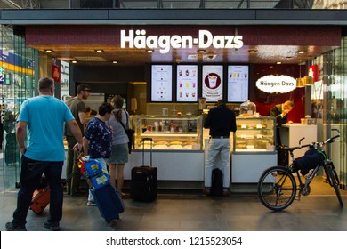 Frankfurt/ Germany - October 16 2018: Busy Haagen Dazs Ice Cream Shop With Many Customers Buying Delicious Ice Cream. Haagen-Dazs Is An American Ice Cream Brand, Sold All Over The World