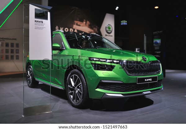 FRANKFURT, GERMANY - SEPT 2019: lime green\
SKODA KAMIQ subcompact crossover SUV, IAA International Motor Show\
Auto Exhibtion.