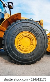 FRANKFURT, GERMANY - SEPTEMBER 05, 2014: Liebherr tractor with imense Michelin tire. Michelin is a tire manufacturer based in Clermont-Ferrand in the Auvergne region of France