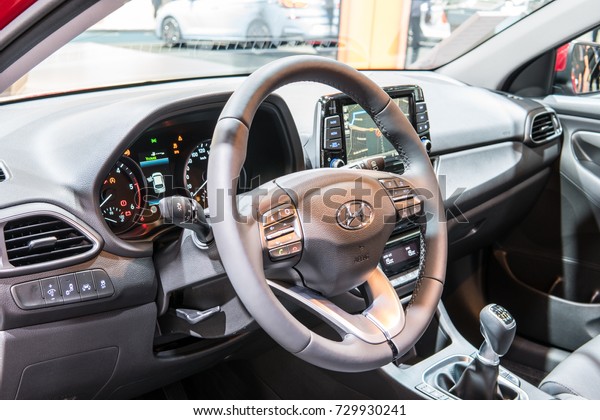 Frankfurt, Germany, September 13, 2017:\
metallic red Hyundai new i30 Wagon at 67th International Motor Show\
(IAA), control board, steering wheel, upholstery,\
seats