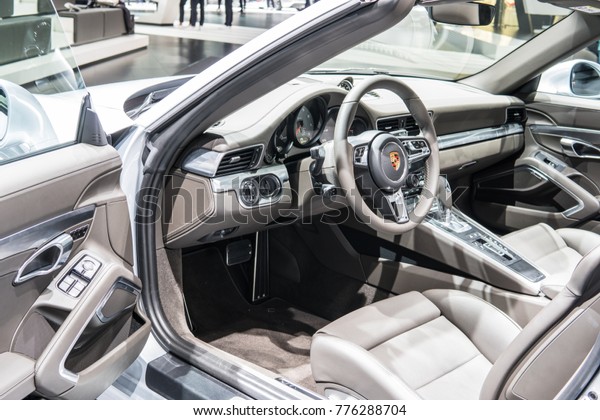 Frankfurt, Germany,\
September 13, 2017: metallic silver Porsche 911 Targa 4S at 67th\
International Motor Show (IAA), cabrio, control board, steering\
wheel, upholstery, seats,\
