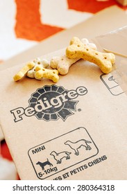 FRANKFURT, GERMANY - SEPTEMBER 20, 2014: Box of Pedigree Petfoods with dog food on top. Pedigree is a subsidiary of the American group Mars specializing in pet food, with factories in England