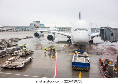 Frankfurt, Germany, September, 2018, Frankfurt Airport With An Airplane Taxiing Out With A Pushback Tug