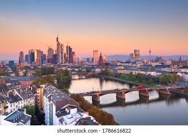 Frankfurt, Germany skyline over the Main River at dusk.