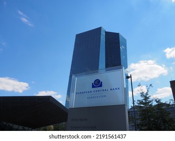 Frankfurt Hessen, Germany - August 16 2022: New European Central Bank (ECB) Headquarters Building Entrance With EU Flags In Frankfurt Germany.