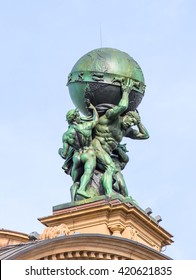 FRANKFURT AM MAIN, GERMANY- APRIL 30, 2016: Facade of Deutsche Bahn railway central station (Hauptbahnhof). Atlas God Statue