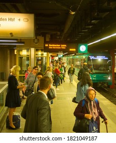 FRANKFURT AM MAIN, GERMANY - AUGUST 31, 2018: Train Arriving To Crowded Subway Platform, Frankfurt, Germany 