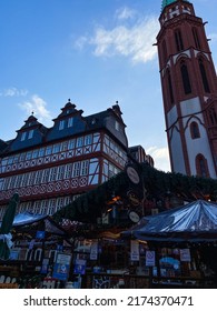 Frankfurt Am Main, Germany, December 7, 2021: The Römerberg Square. The Historical Old Town Center, Including Its Splendid Half-timbered Houses And The Alte Nicolaikirche (St Nicholas Church).