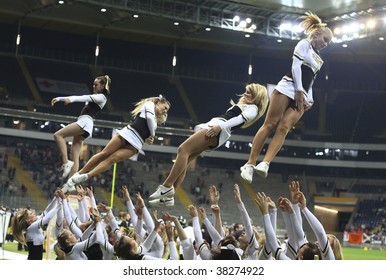 FRANKFURT - OCT 3: Cheerleaders dancing for the audience at German Bowl XXXI on Oct 3, 2009 in Frankfurt, Germany.