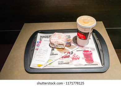 Frankfurt (Oder), Germany - August 18, 2018: McDouble Tex Mex Sandwich And Fanta For Drink.