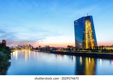 Frankfurt skyline with ECB European Central Bank Main river skyscraper in Germany twilight
