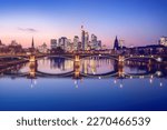 Frankfurt skyline with purple light and Alte Brucke (Old Bridge) - Frankfurt, Germany