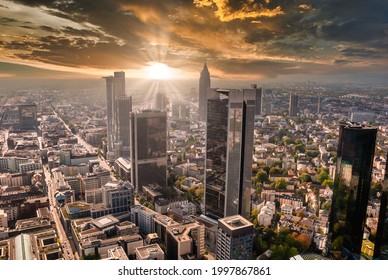 Frankfurt Skyline at sunset with sun flare skyscraper bank office buildings