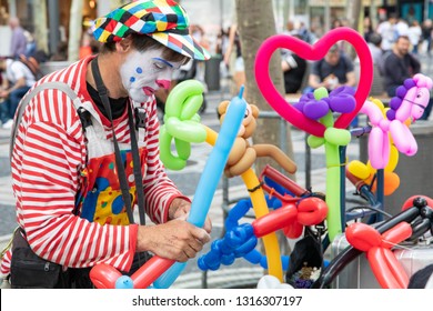 Frankfurt/Germany - 25.06.2018: Street Performer (clown) Making Balloon Shapes