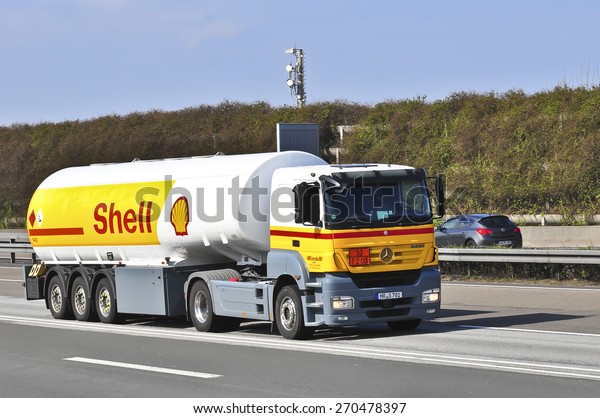 FRANKFURT,GERMANY - MARCH 28:Shell Oil Truck on\
the highway on March 28,2015 in Frankfurt, Germany.Royal Dutch\
Shell plc, commonly known as Shell, is an Anglo-Dutch multinational\
oil and gas\
company