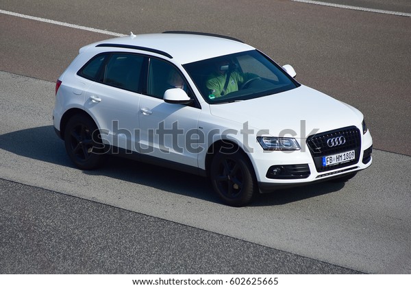 FRANKFURT,GERMANY-MARCH 16: Audi car on the\
freeway on March 16,2017 in Frankfurt,Germany.Audi-German\
automobile manufacturer that designs,engineers, produces, markets\
and distributes luxury\
vehicles.