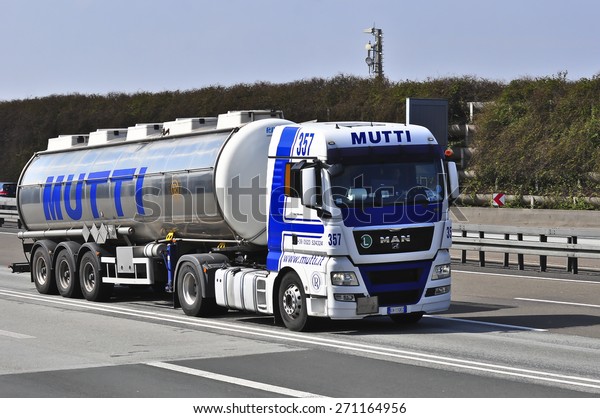FRANKFURT,GERMANY-MARCH 28:MAN oil truck on the\
highway on March 28,2015 in Frankfurt,Germany. MAN SE, formerly MAN\
AG, is a German mechanical engineering company and parent company\
of the MAN\
Group.