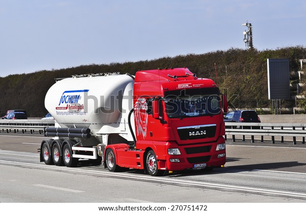FRANKFURT,GERMANY-MARCH 28:NAN oil truck on the\
highway on March 28,2015 in Frankfurt,Germany.MAN SE, formerly MAN\
AG, is a German mechanical engineering company and parent company\
of the MAN\
Group.
