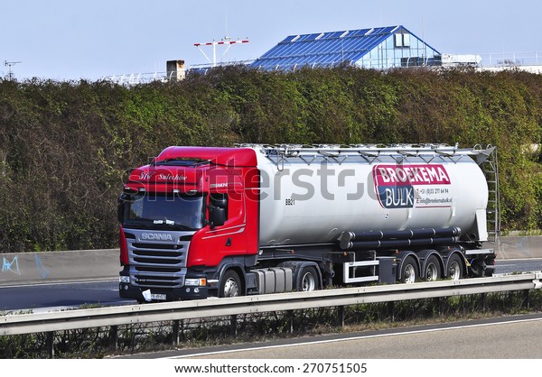 FRANKFURT,GERMANY-MARCH 28:SCANIA oil truck on the\
highway on March 28,2015 in Frankfurt,Germany.Scania, is a major\
Swedish automotive industry manufacturer of specifically heavy\
trucks and\
buses.