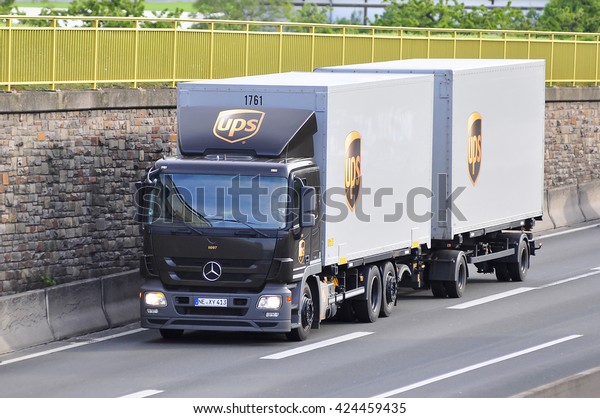FRANKFURT,GERMANY-MAY 11: truck of UPS on the\
higway on May 11,2015 in Frankfurt,Germany.United Parcel Service is\
the world\'s largest package delivery company in Georgia, United\
States.