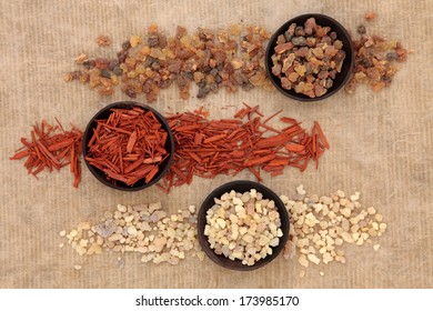 Frankincense, Myrrh And Sandalwood Incense Selection Over Distressed Paper Background.