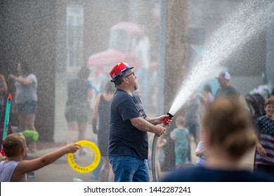 Franklin, Ohio/USA -July 4th, 2019. Dubbed the Wettest parade in Ohio.  The annual 4th of July parade in Franklin, Ohio didn't disappoint on a hot July day.  Hundreds lined the streets to get soaked.