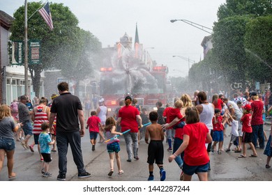Franklin, Ohio/USA -July 4th, 2019. Dubbed the Wettest parade in Ohio.  The annual 4th of July parade in Franklin, Ohio didn't disappoint on a hot July day.  Hundreds lined the streets to get soaked.