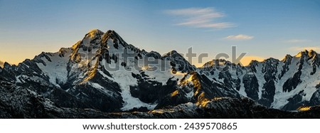 Franz Josef Mountain at sunrise, captured from a unique aerial perspective. 