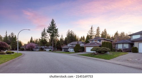 Fraser Heights, Surrey, Greater Vancouver, BC, Canada. Street View In The Residential Neighborhood During A Colorful Spring Season. Colorful Sunset Sky Art Render.