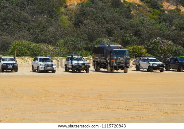 Fraser Island, Qld, Australia - January 27 2018:\
4wd vehicles at a popular beach on Fraser Island, the largest sand\
island in the world