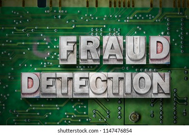 Fraud Detection Phrase Made From Metallic Letterpress Blocks On The Pc Board Background