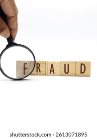 Fraud text Using Magnifying Glass For Audit And Fraud Investigation