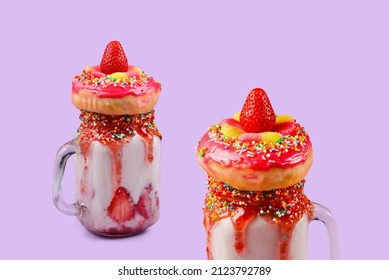 Freakshake. Extreme milkshake with strawberry, jelly sweets, donut.  - Powered by Shutterstock