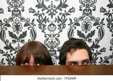 Freaky Couple Hiding Under The Table