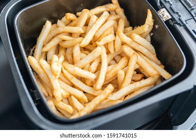 Frech Fries In Deep Frier Ready To Eat