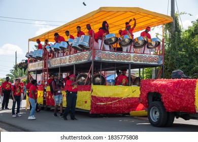 Frederiksted,St. Croix/US Virgin Islands-January 4,2020: Rising Starts Youth Orchestra playing steel pan drums at the adult parade in downtown Frederiksted in the US VI