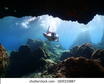  Free Diving Apnea Underwater Cave Sun Beams And Rays Ocean Scenery With Human