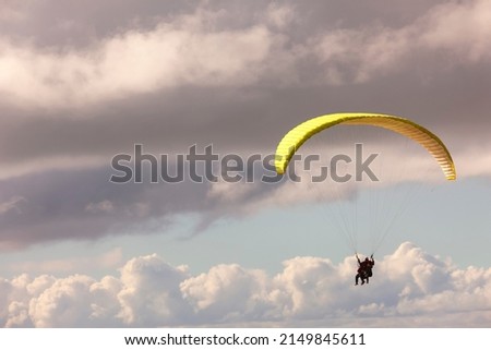 Free flight, paragliding. Extreme sports. libertine spirit, a thirst for the infinite, an open mind, the experience of new sensations, overcoming the limits of the human body, adventure concept.